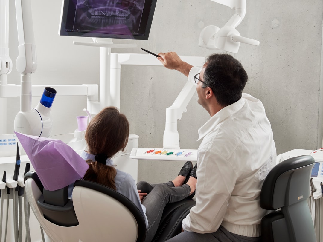 Warm dental consultation between dentist and patient