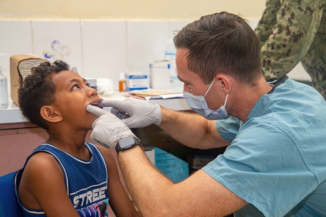 Warm interaction between dentist and young patient in child-friendly environment